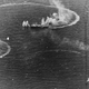 The Japanese aircraft carrier Zuikaku (center) and the destroyers Akizuki and Wakatsuki under attack from US Navy carrier aircraft. Zuikaku was hit by several bombs during these attacks but was not sunk. (US Navy)